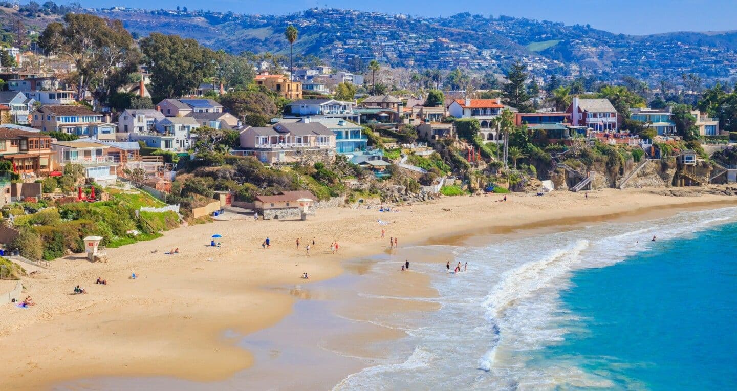 A shoreline with Laguna Beach in the background.