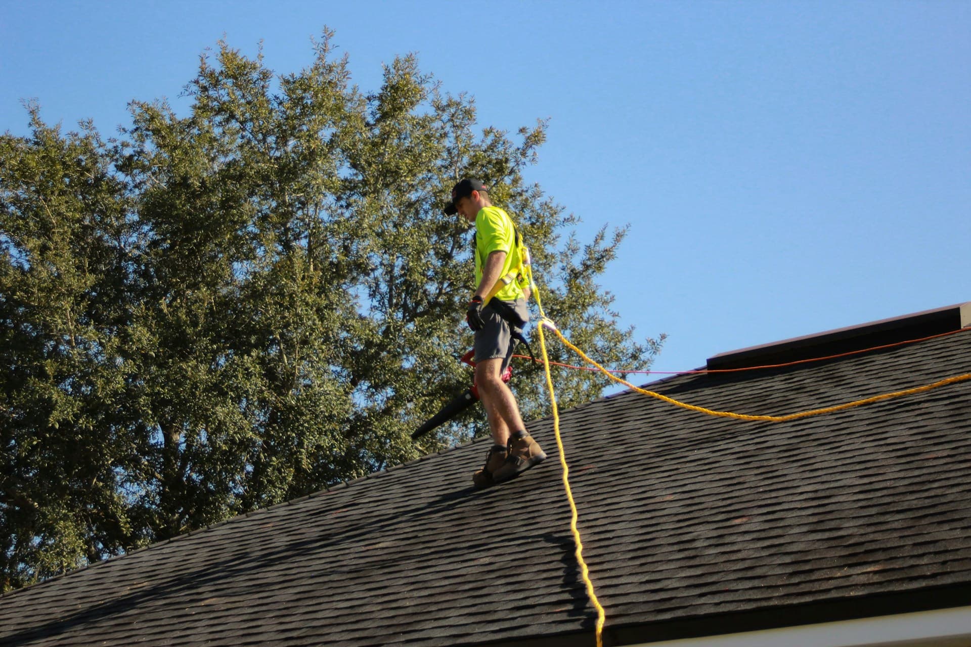 Man Inspecting Roof